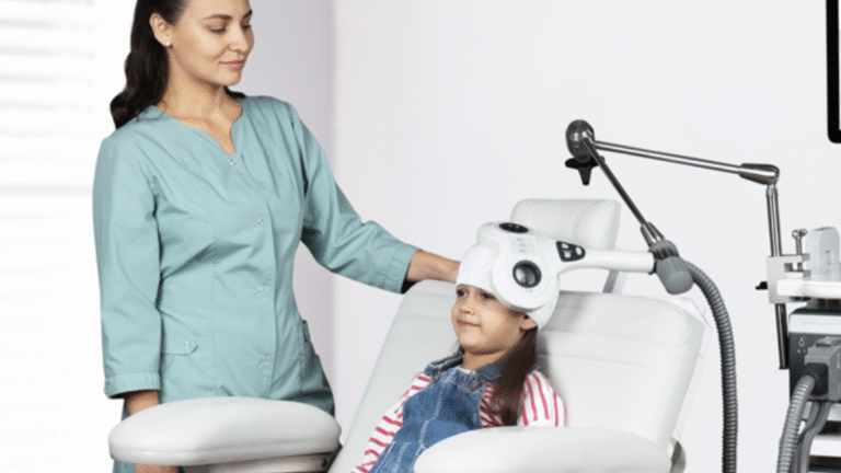 Child receiving pediatric TMS therapy under professional supervision.