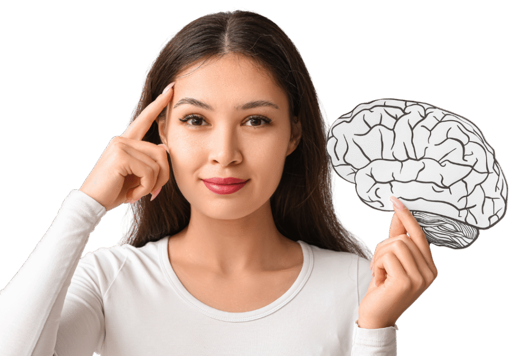 Mujer joven señalando su cabeza mientras sostiene una ilustración de un cerebro, con expresión de seguridad.